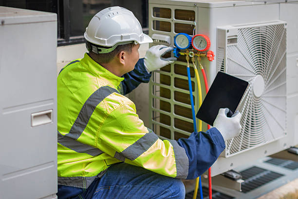 Professional Heat Pump Repair technician working in Tuxedo Park, NY